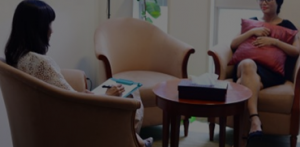 Two women in therapy session.